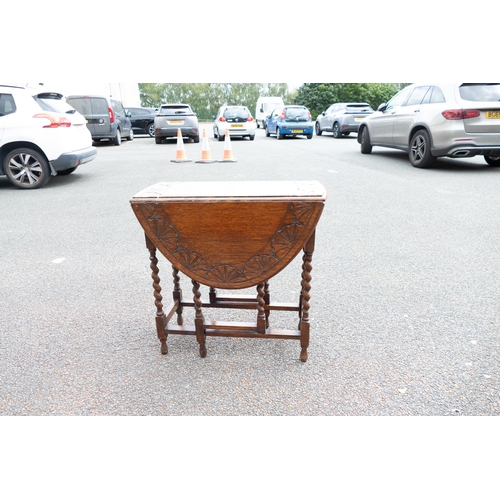 650 - Small Barley Twist Legged Drop Leaf Table with carved top, length 76cm