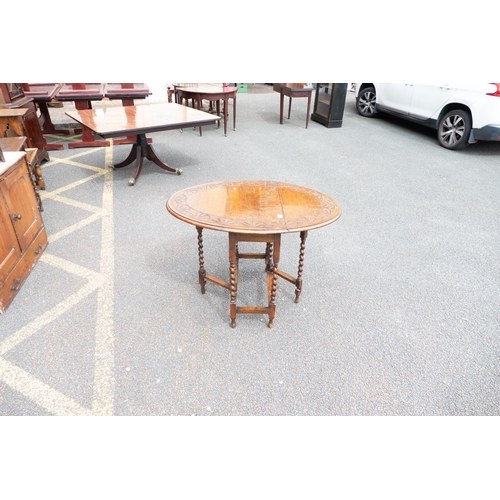 650 - Small Barley Twist Legged Drop Leaf Table with carved top, length 76cm