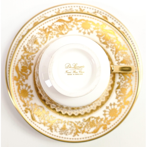 102 - De Lamerie Fine Bone China, heavily gilded Versailles Countess Armorial patterned Trio , specially m... 