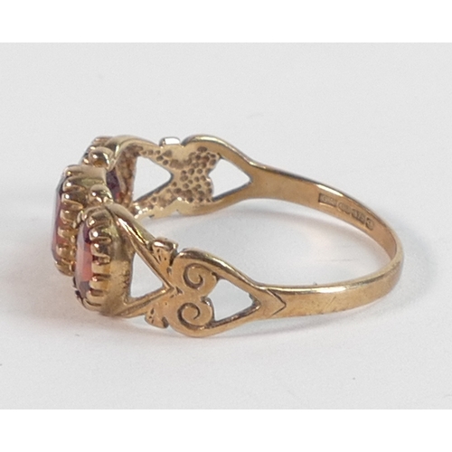 782 - 9ct gold ring set with three light brown stones, size N,2g.