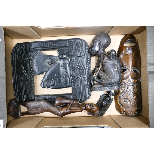 43 - A collection of carved African type figures & wall plaque