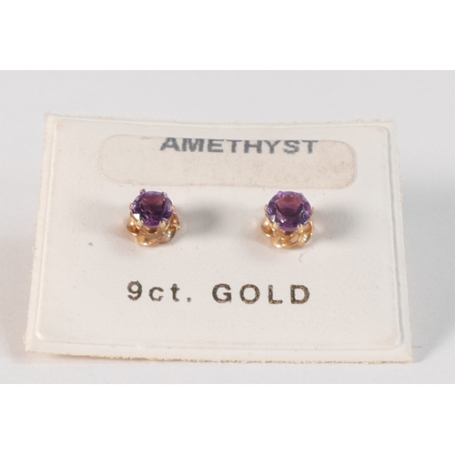 799 - Pair 9ct gold amethyst stud earrings.