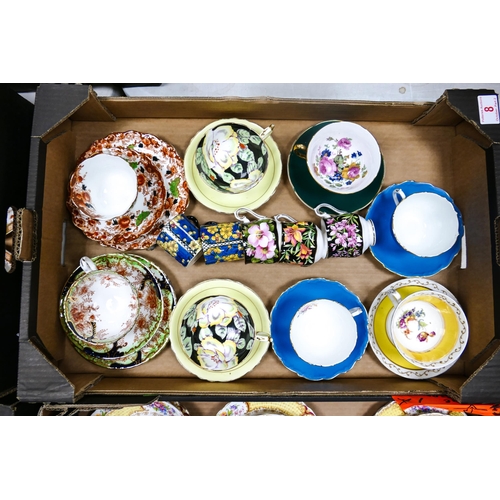 8 - A collection of cups and saucers to include Royal Albert provincial flowers, Coalport blue and flora... 