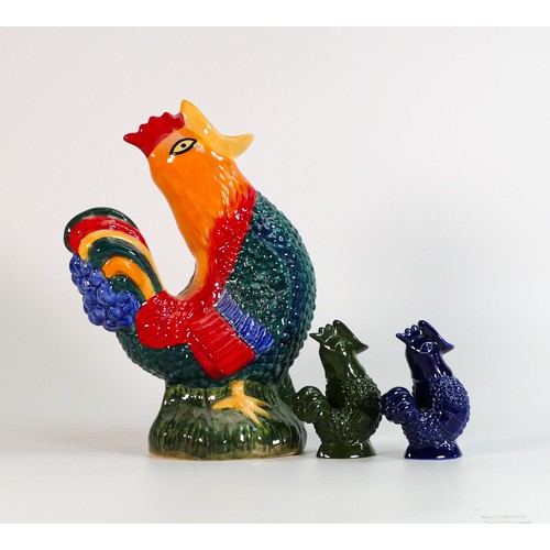 174 - Wade collection of multicoloured Cockerel Gluggle jugs. These were removed from the archives of the ... 