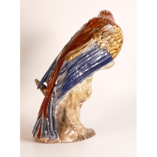 184 - A rare Wade Earthenware model of a parrot perched on a branch designed by Colin Melbourne, C1950s, n... 