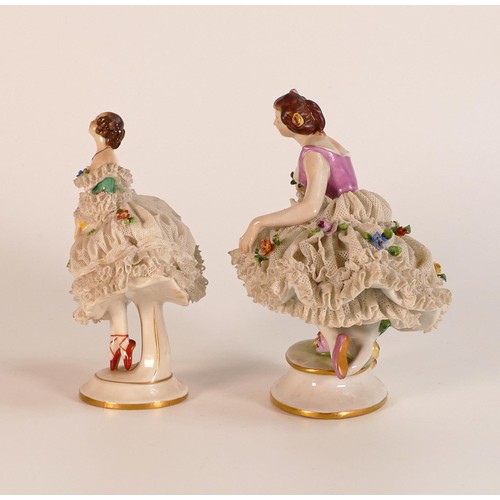 847 - Two Volkstedt Dresden lace figures, early 20th century, in the form of ballerinas. The larger exampl... 