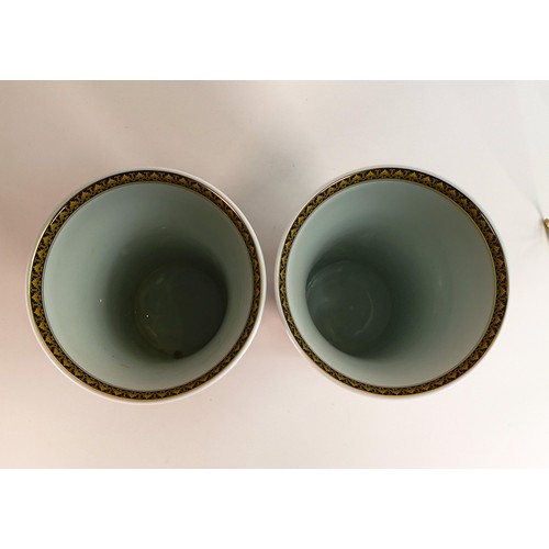 856 - A pair of Rosenthal Versace Medusa flared vases. Height 26cm, diameter 15.5cm