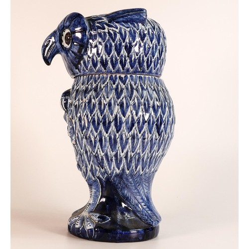 869 - Dutch Delft blue and white tobacco jar and cover, faint mark DSK to base. Modelled as an owl, the co... 