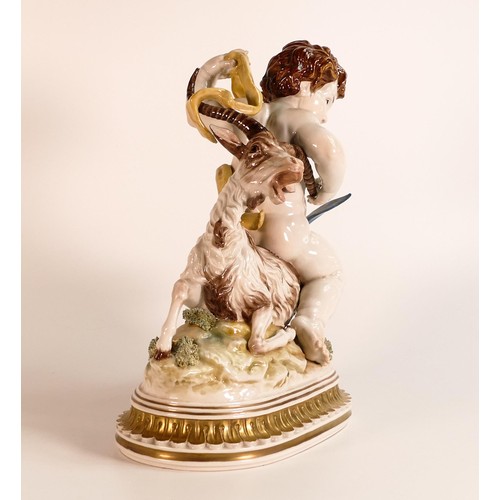 871 - An Algora Porcelain figure, An Allegory to Capricorn. Putti astride a Sea Goat with naturally moulde... 