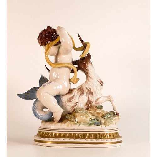 871 - An Algora Porcelain figure, An Allegory to Capricorn. Putti astride a Sea Goat with naturally moulde... 