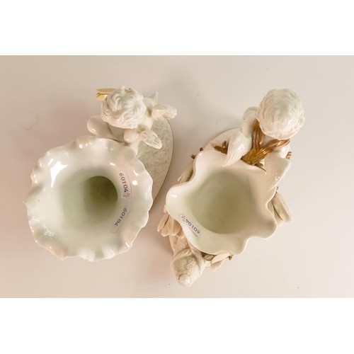 874 - Moore Bros., two small vases, moulded as Cornucopia with figural Putti besides. The body of the vase... 