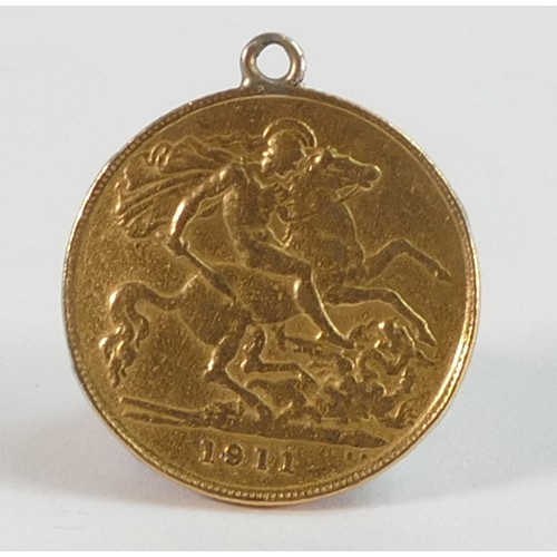 2051 - HALF sovereign 22ct gold coin 1911, with soldered ring to top for use as a pendant.  Gross weight 3.... 