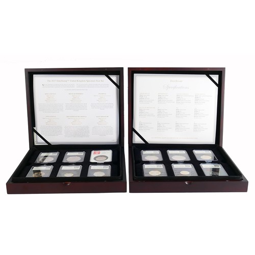 2052 - Two wooden cases containing 12 x brilliant uncirculated UK coins encapsulated / slabbed, including £... 