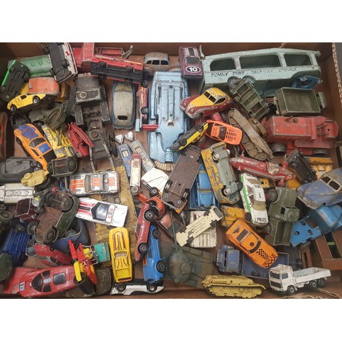 576 - A large quantity of play-worn Dinky, Corgi and similar die-cast vehicles, including petrol pumps etc... 