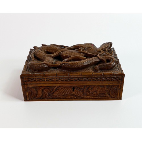 449 - Early 20th century wood box, carved all around with dragons, small piece of carving missing top left... 