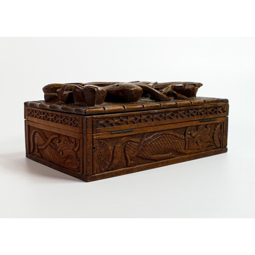 449 - Early 20th century wood box, carved all around with dragons, small piece of carving missing top left... 