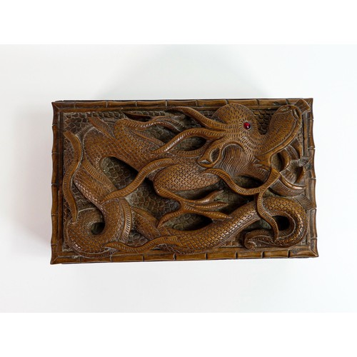 449 - Early 20th century wood box, carved all around with dragons, small piece of carving missing top left... 