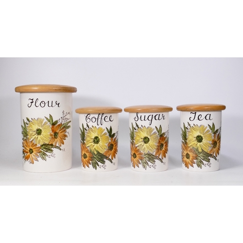 243 - A Set of Four Crown Devon Storage Jars; to include jars labelled Flour, Tea, Coffee and Sugar (4)