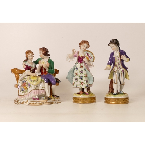 396 - Three Volkstedt Porcelain Figures, one pair depicting boy and girl in fashionable attire one heavily... 