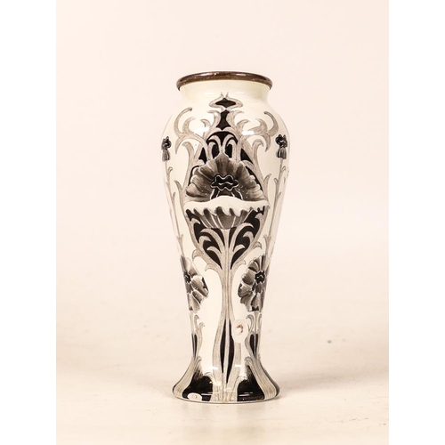 344 - Moorcroft enamel black & white florian design. Limited edition 100/150. Height 10cm