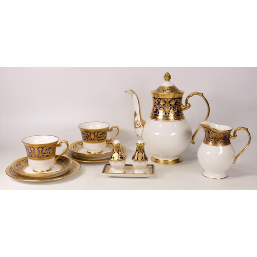 511 - De Lamerie Cobalt blue Robert Adam pattern  to include 2 trio's, milk jug , tea pot and condiment se... 