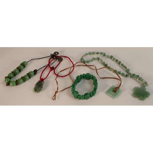 733 - A small collection of Chinese hardstone and jade jewellery including pendants, bracelet, necklaces e... 