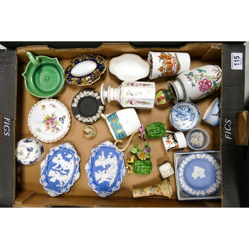 115 - A mixed collection of items to include relief decorated pottery, Wedgwood jasperware, Coalport novel... 