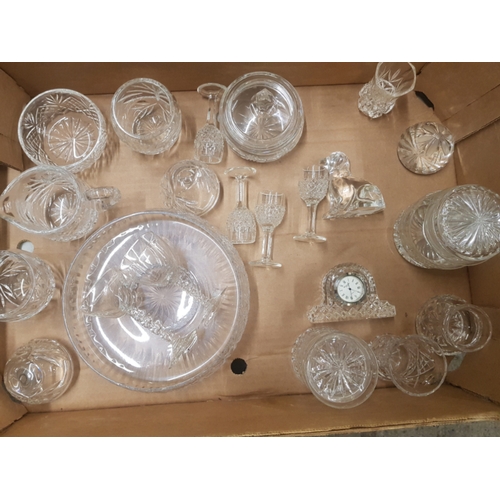 402 - A collection of Crystal ware items to include small waterford clock, crystal vases, paperweights, gl... 