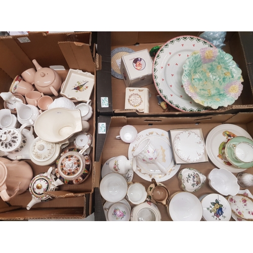 275 - A mixed collection of ceramic items to include Bunnykins moneyboxes, vintage tea pots, Spode lidded ... 