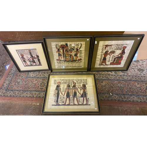 57 - A collection of framed Egyptian themed papyrus prints, size of largest 98cm x 76cm (5).