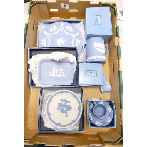 12 - A collection of boxed Wedgwood Blue Jasperware items to include boxed tankard, Coffee Can & Saucer, ... 