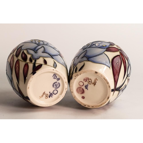 312 - A pair of Moorcroft vases in the Jacobs Ladder design. Dated 2004, height 9cm. 1 box