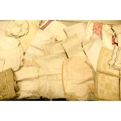 41 - A collection of early 20th Century & later embroidered linen, Table cloths & Lace items