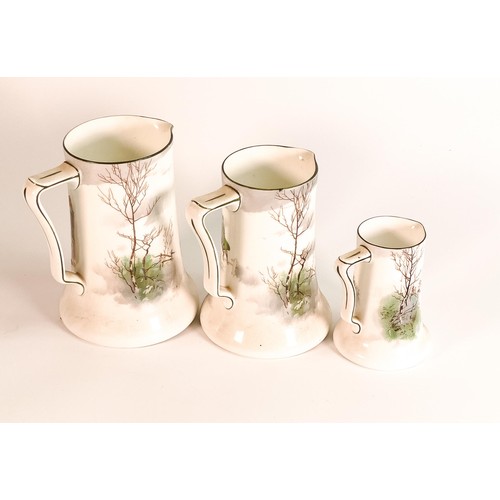 20 - Royal Doulton Hunting Theme Series ware graduated set of three jugs, tallest 15.5cm (3)