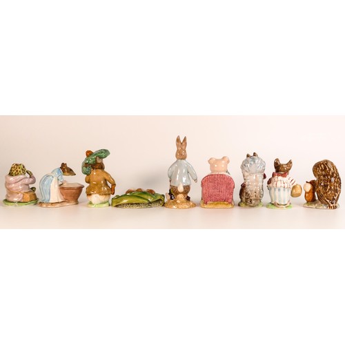 50 - A collection of Beswick & Royal Albert Beatrix Potter figures to include - Mrs Tittlemouse (2a), Tim... 