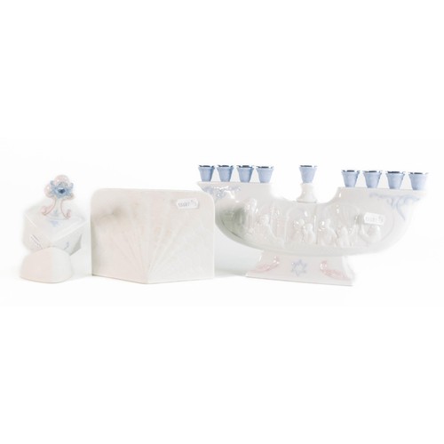 88 - Lladro porcelain models to include Menorah 6706, Dreidel 6679 and Charter Member Plaque 7601 (3)