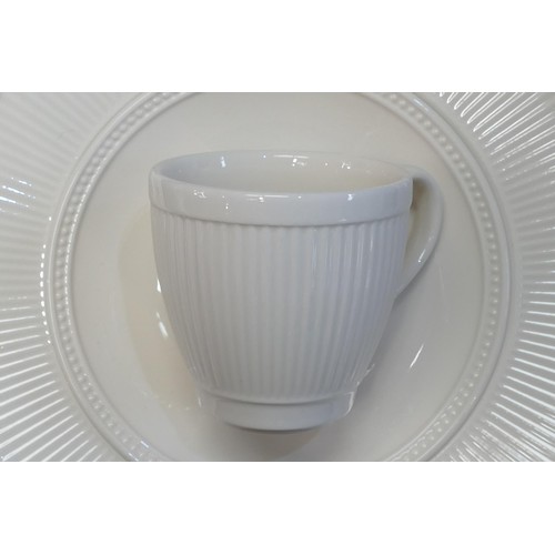 49 - A large collection of Wedgwood Windsor pattern tea & dinner ware including trios, tea pot, mugs, fru... 