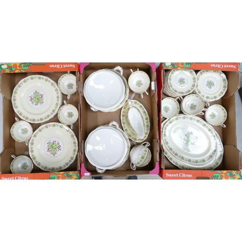 54 - A large collection of Royal Albert dinner ware decorated with ivy leaves and red berries to include ... 