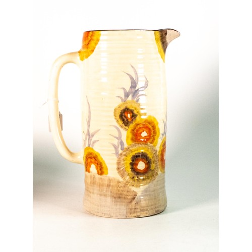 101 - Clarice Cliff, ribbed Lemonade jug in the 'Rhodanthe' pattern, hand painted brown and orange shades ... 