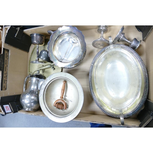 329 - A mixed collection of silver plated & brass items to include candlesticks, dinnerware, nut cracker e... 