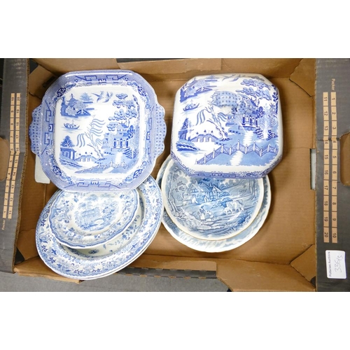 335 - A large collection of Blue & White dinnerware including Tureens, plates, jugs  over sized cups etc (... 