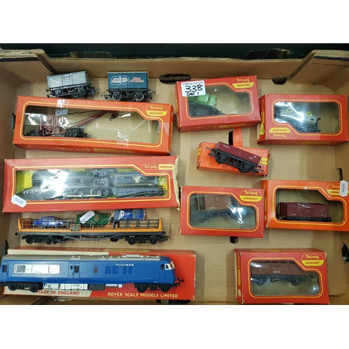 338 - A collection of Triang Hornby 00 gauge scale models to include Diesel Pullman engine, R.122 cattle w... 