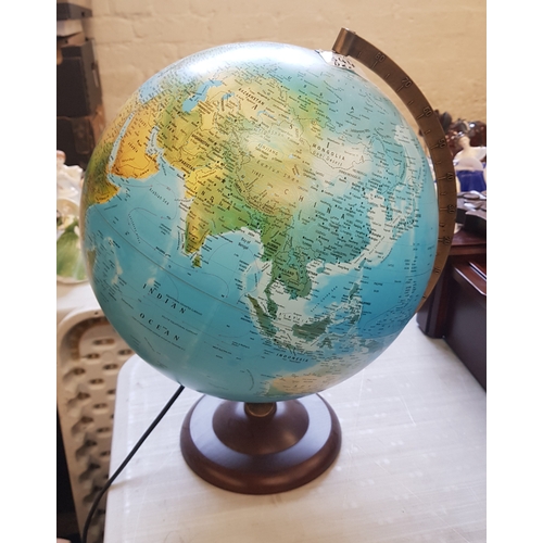 344 - Danish made illuminating globe, overall height 39cm.