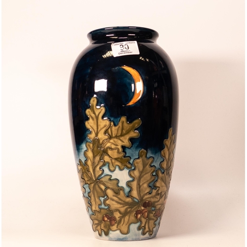 80 - A limited edition Moorcroft vase, decorated with an eagle owl, 131/500, 32cm high