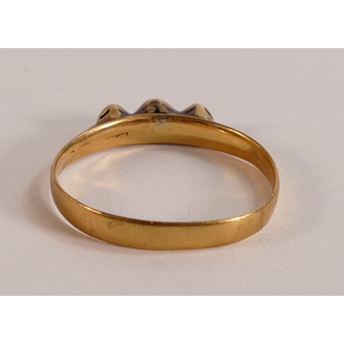 657 - 18ct gold or higher (tested) with later set diamonds, in an old ring box.  Weight 1.97g