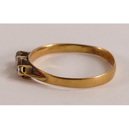 657 - 18ct gold or higher (tested) with later set diamonds, in an old ring box.  Weight 1.97g