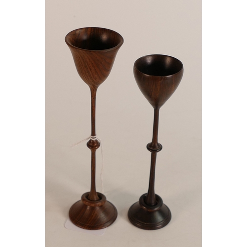 673 - High quality treen turned rosewood stemmed cups of unknown origin, age or use.  Largest 15cm high.