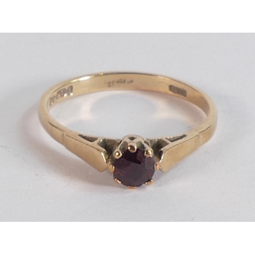 687 - 9ct gold ring set with brown stone, ring size L, 1.6g.