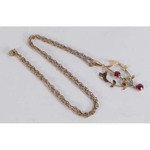 688 - 9ct gold necklace with 9ct Art Noveau pendant set with red stones, 4.2g.