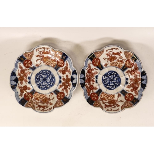 506 - Two Early 20th Century Japanes Imari Plates, one with re glue section, diameter 19cm(2)